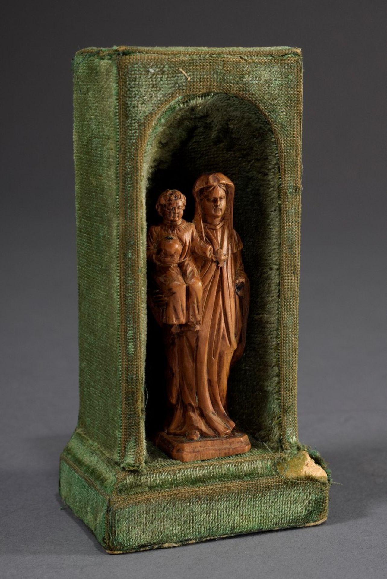 Miniature carving "Madonna with Child", boxwood, in a round arch niche covered with velvet, German 