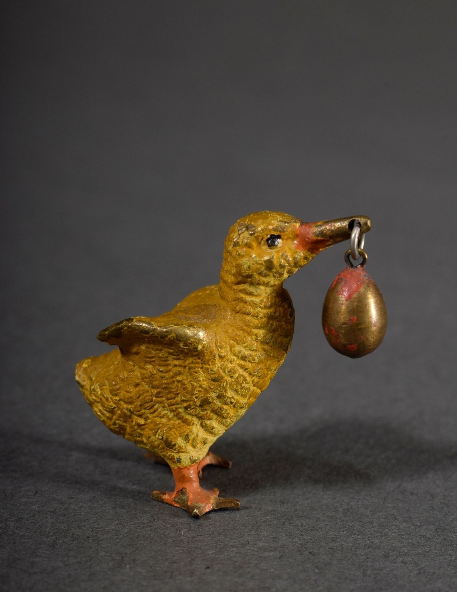 Viennese bronze "Chick with egg", colourfully painted, h. 3cm, slightly bumped and bent