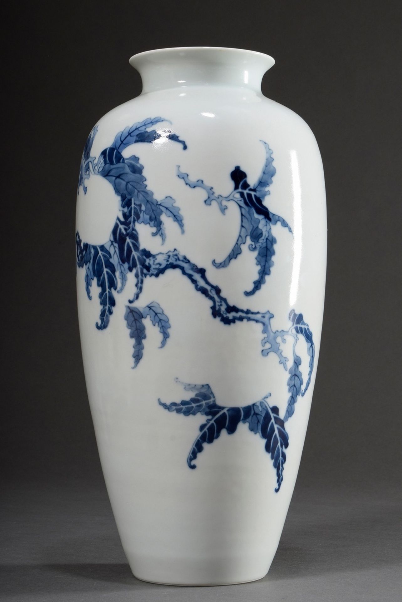 A slender Chinese porcelain vase with unfinished floral blue painting decoration (peaches between t