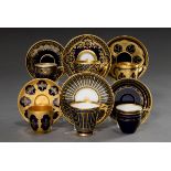 6 Diverse Porzellan Mokkatassen/UT mit unterschiedlichen floralen und ornamentalen Golddekoren auf