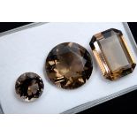 3 Ungefasste Rauchquarze im Facettenschliff (zus. ca. 27ct, Ø 9,8-16,8mm, 17,8x12,9mm)