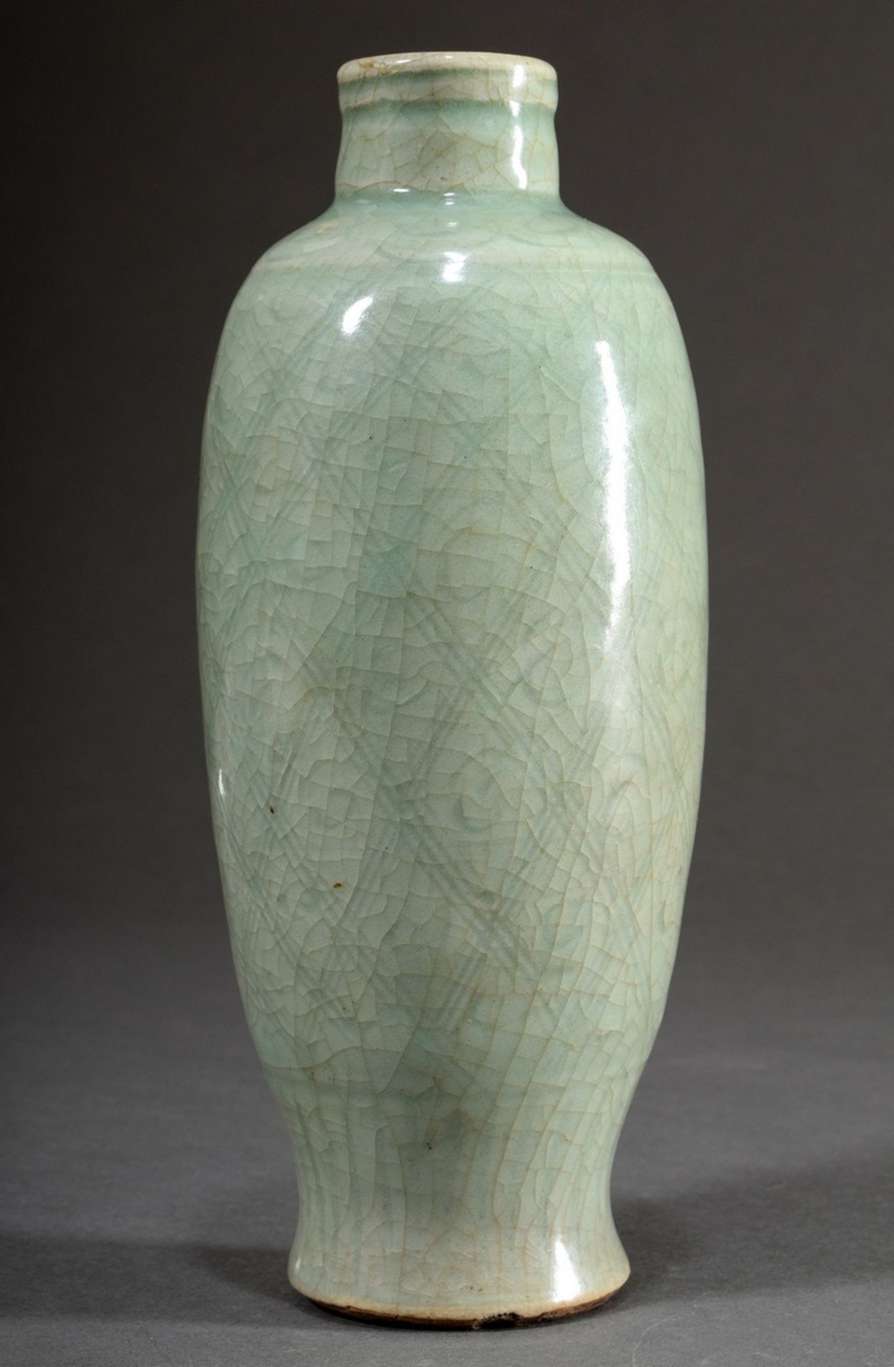 Slender Chinese porcelain vase with ovoid body, crackled celadon glaze and delicate incised decorat