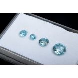 4 Ungefasste blaue Zirkone (zus. ca. 7ct, Ø 4,4-8,6mm)