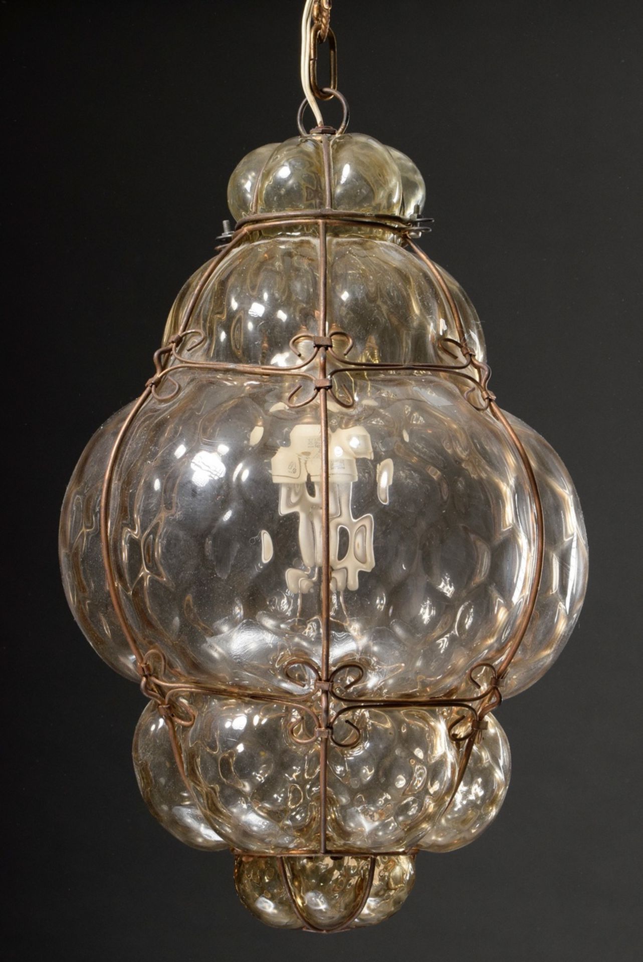 Small Murano baluster light, tong-textured blown smoked glass in wire frame cage, c. 1950/1955, h. 