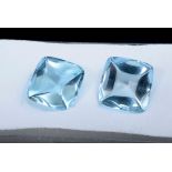 Paar Topase "sky blue" im Cabochon- und Antikschliff " (zus. ca. 24.5ct, 13x13x7,6mm), behandelt