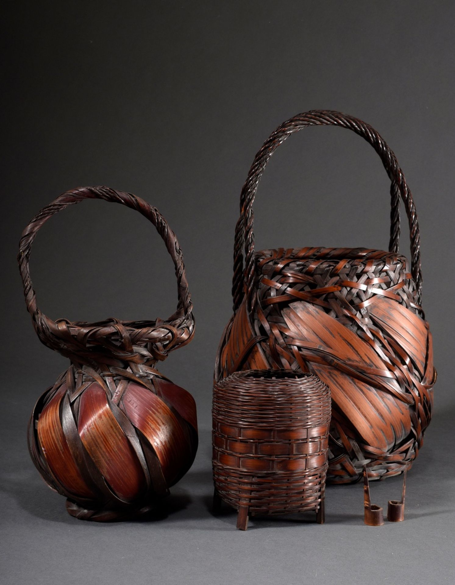 3 Various Japanese baskets with reddish patination: 2 various handle baskets with coarse leaf strip