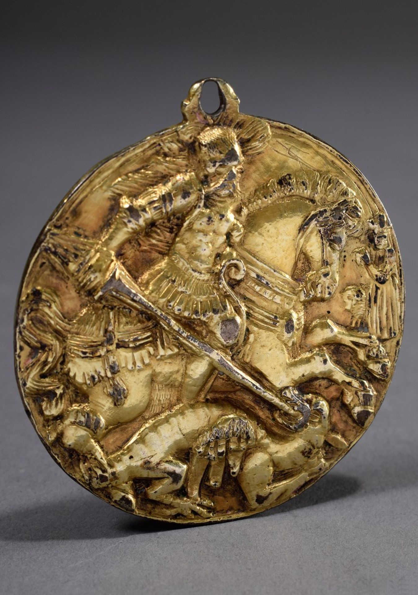 Double-sided amulet with relief "Saint George" and "Mother of God", bronze fire-gilt, mid 16th cent