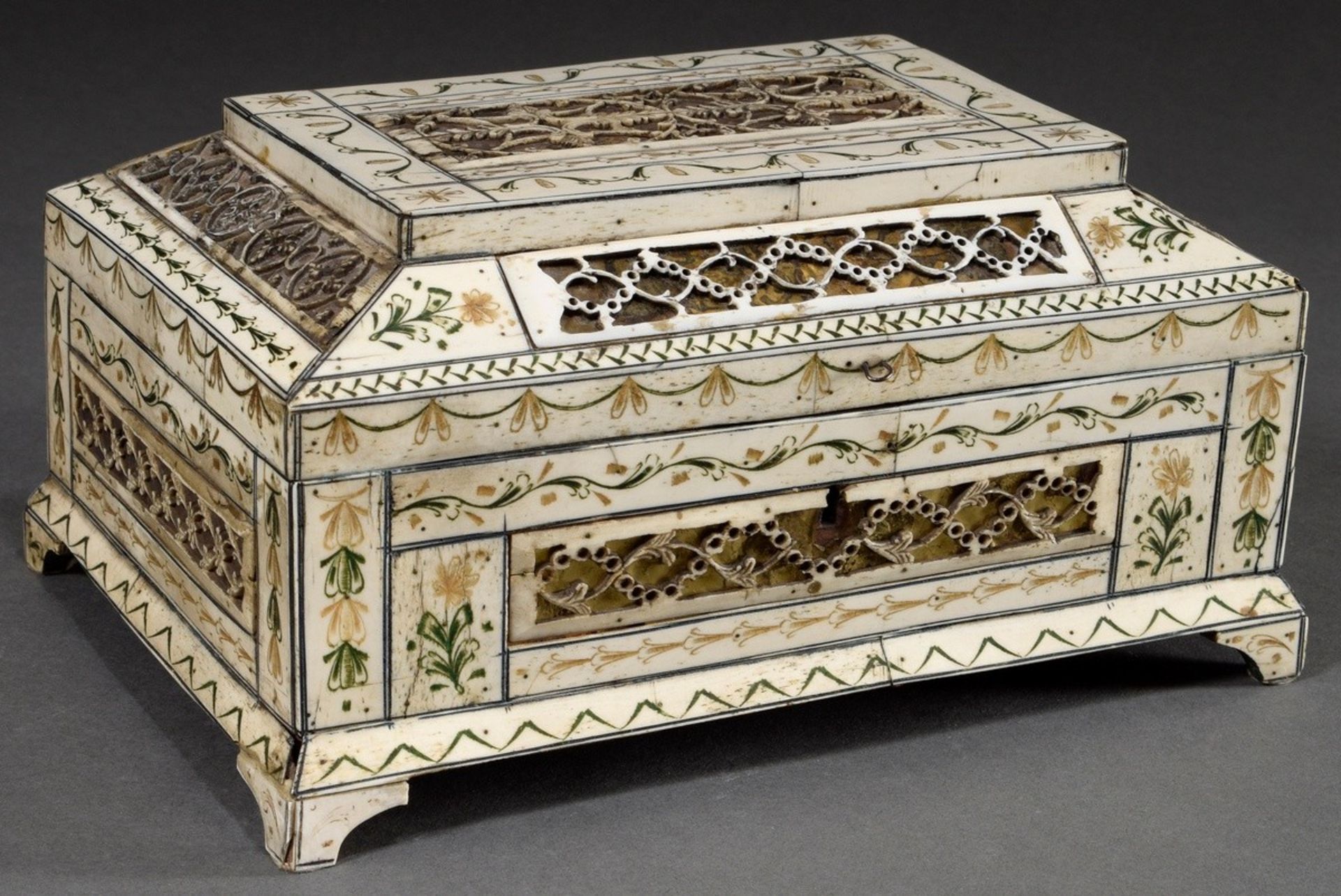Finely sawn Arkhangelsk casket with stepped hinged lid and rectangular body on feet, engraved whale