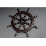 Ship's steering wheel with 8 turned baluster spokes, mahogany with brass ring fitting, iron hub, un