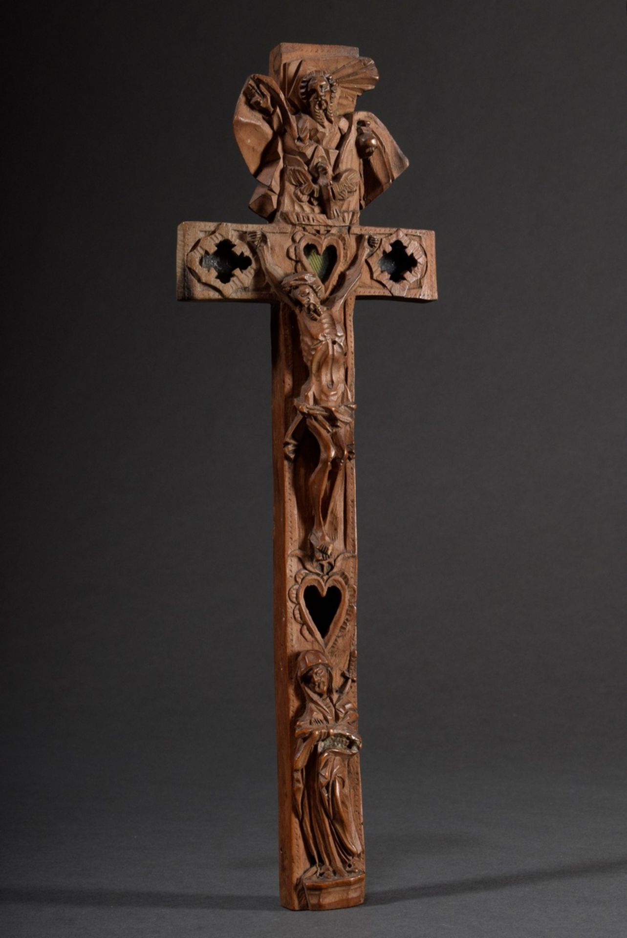 Carved reliquary cross depicting "Christ on the cross", "Mary" and "God the Father", on the reverse