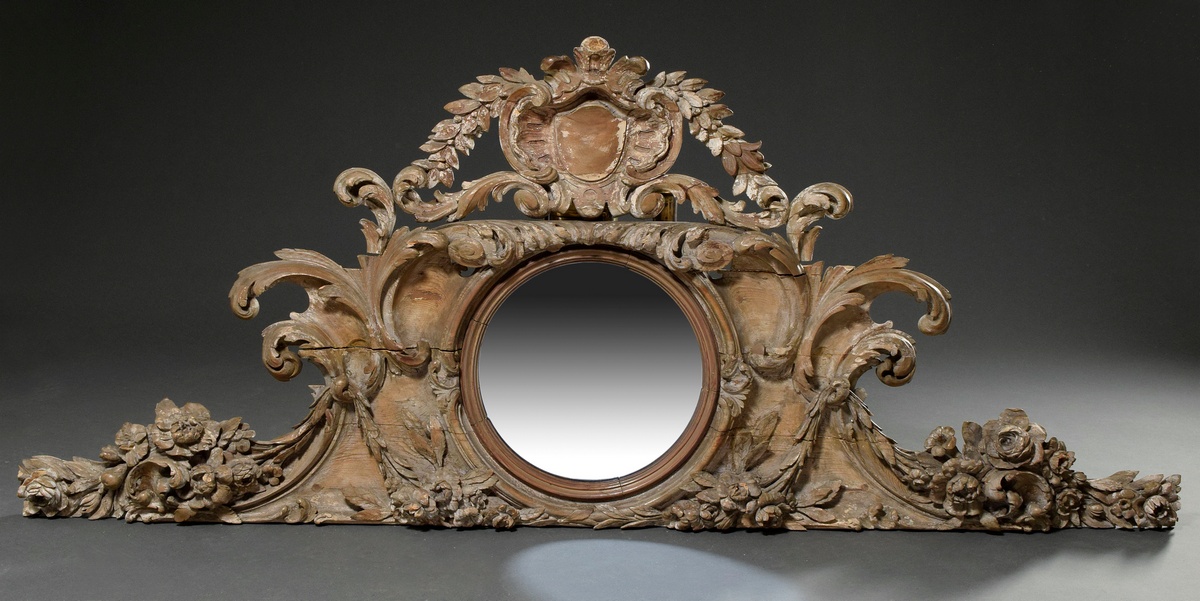 Large carved supraport with central tondo cut-out in floral framing, probably France, 2nd half 19th