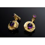 Paar elegante GG 750 Manschettenknöpfe mit Amethyst Cabochons (zus. ca. 4.4ct) und Brillanten (0.18