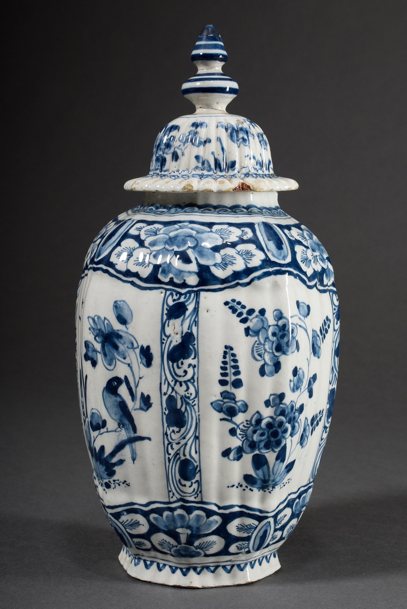Small faience lidded vase with blue painting decor "Blossoms and Birds" in four cartouches on an oc