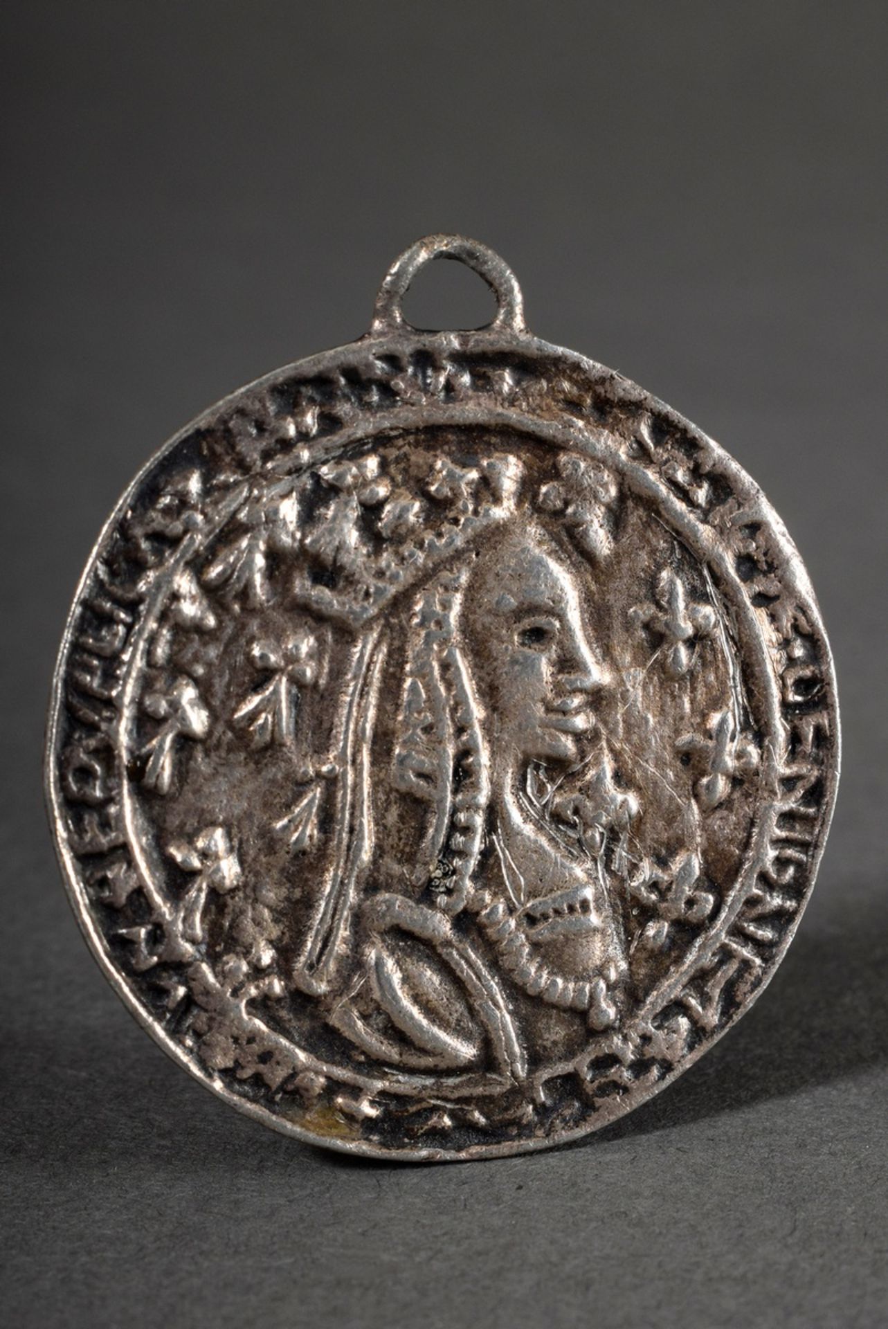 Relief amulet "Portrait of a Queen with Fleur-de-lys" (probably Jeanne de Bourbon, 1338-1378), insc