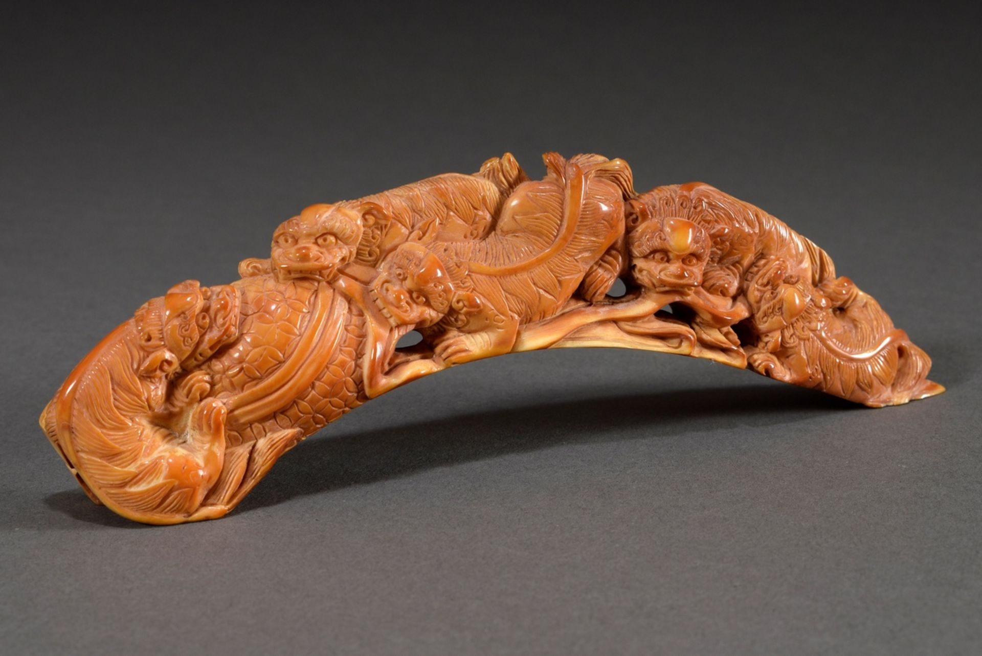 Fine ivory carving "Five Shishis", Japan circa 1900, yellowish discoloured, l. 19cm, permission acc