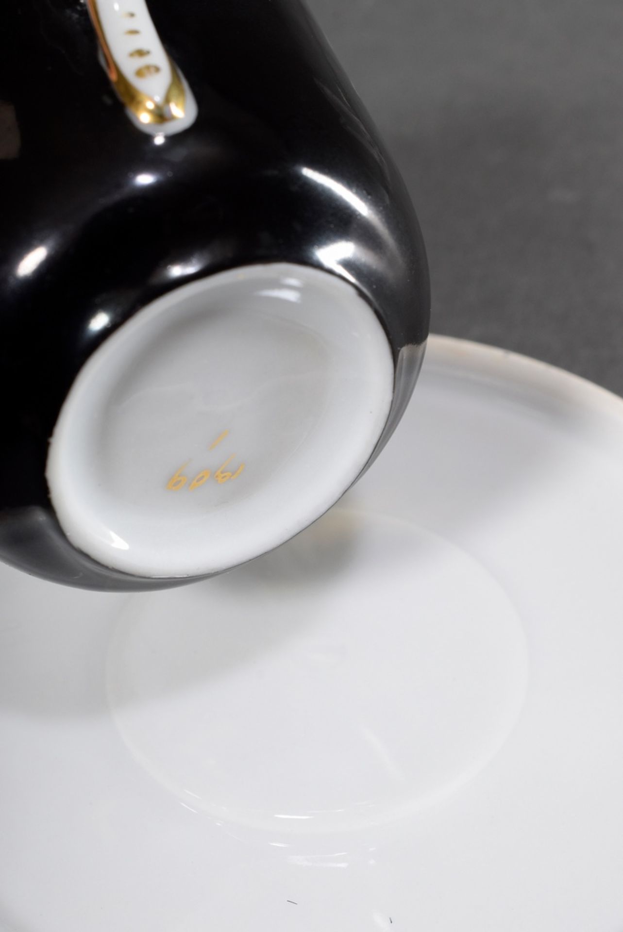 3 Various porcelain mocca cups/saucers with different floral and ornamental gold decorations on a b - Image 4 of 4