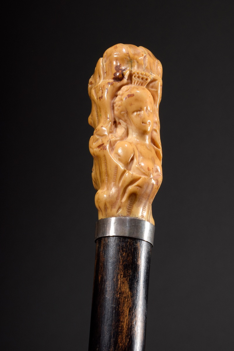 Cane with ivory handle with nude female bust in tree Tromp l'oeil, silver band and ferrule, l. 88cm
