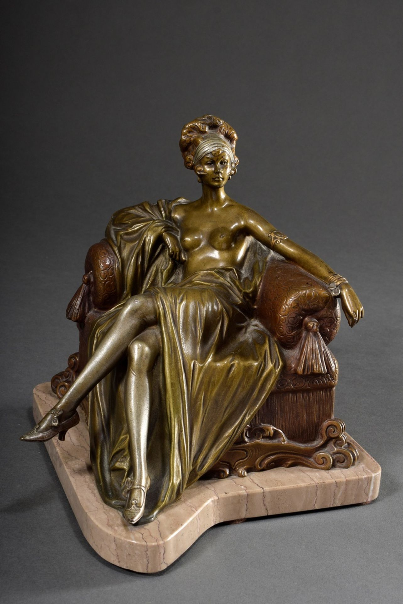 Unknown artist c. 1920 "Lascivious lady on armchair", bronze with various patinas on reddish marble