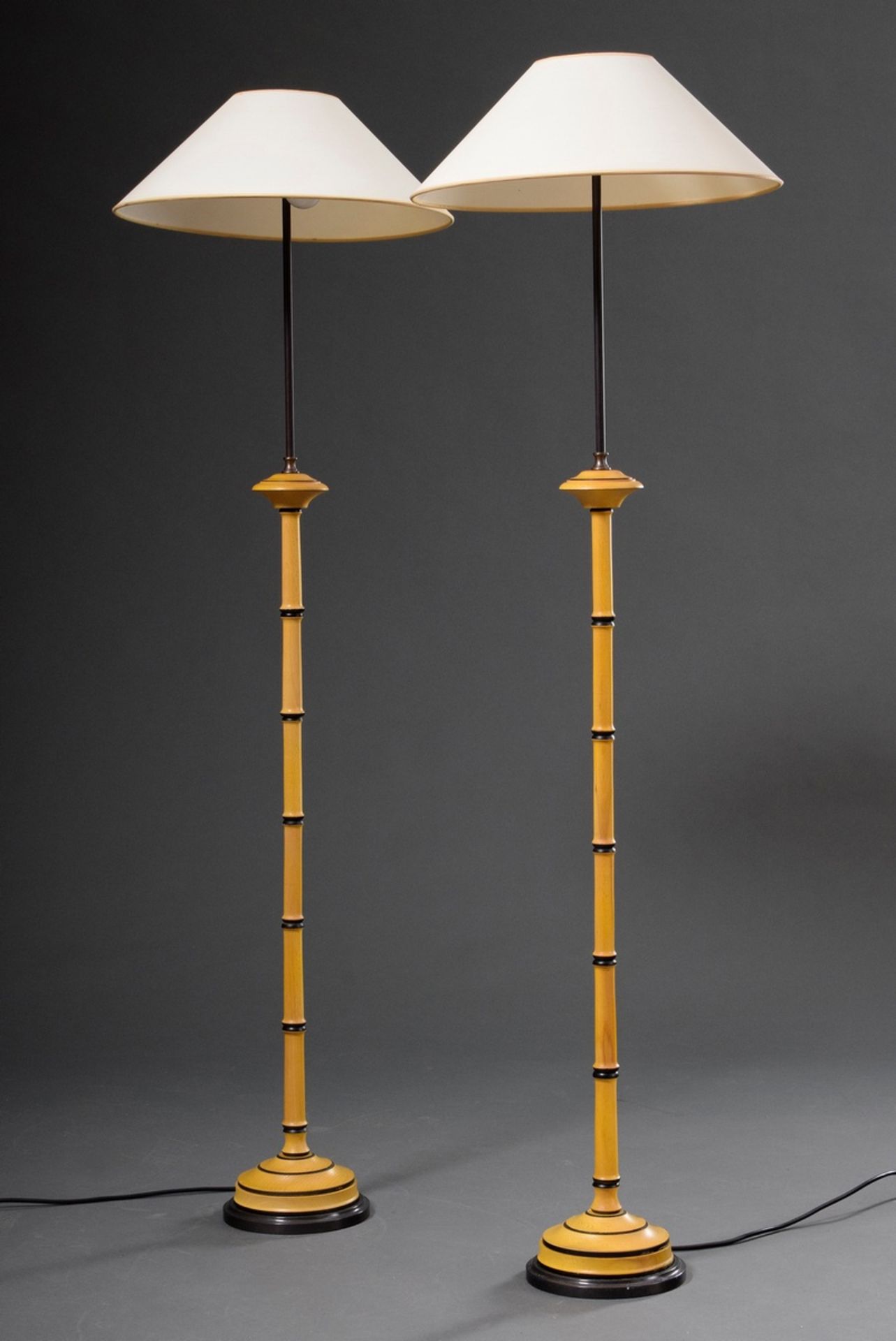Pair of modern colonial style floor lamps with bamboo trompe-l'œil, wood/metal, h. 135cm