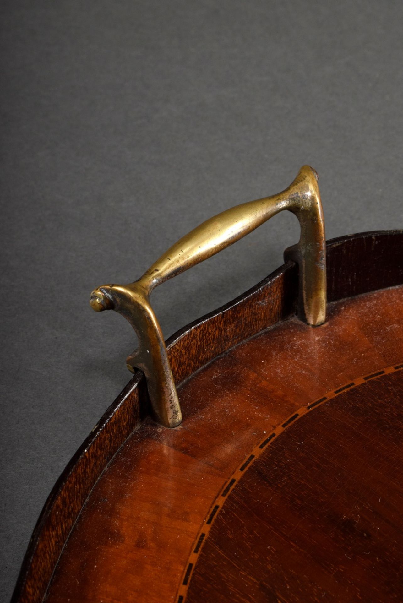 Large oval mahogany tray with ribbon inlay, brass handles on the sides and curved gallery rim, Engl - Image 2 of 3