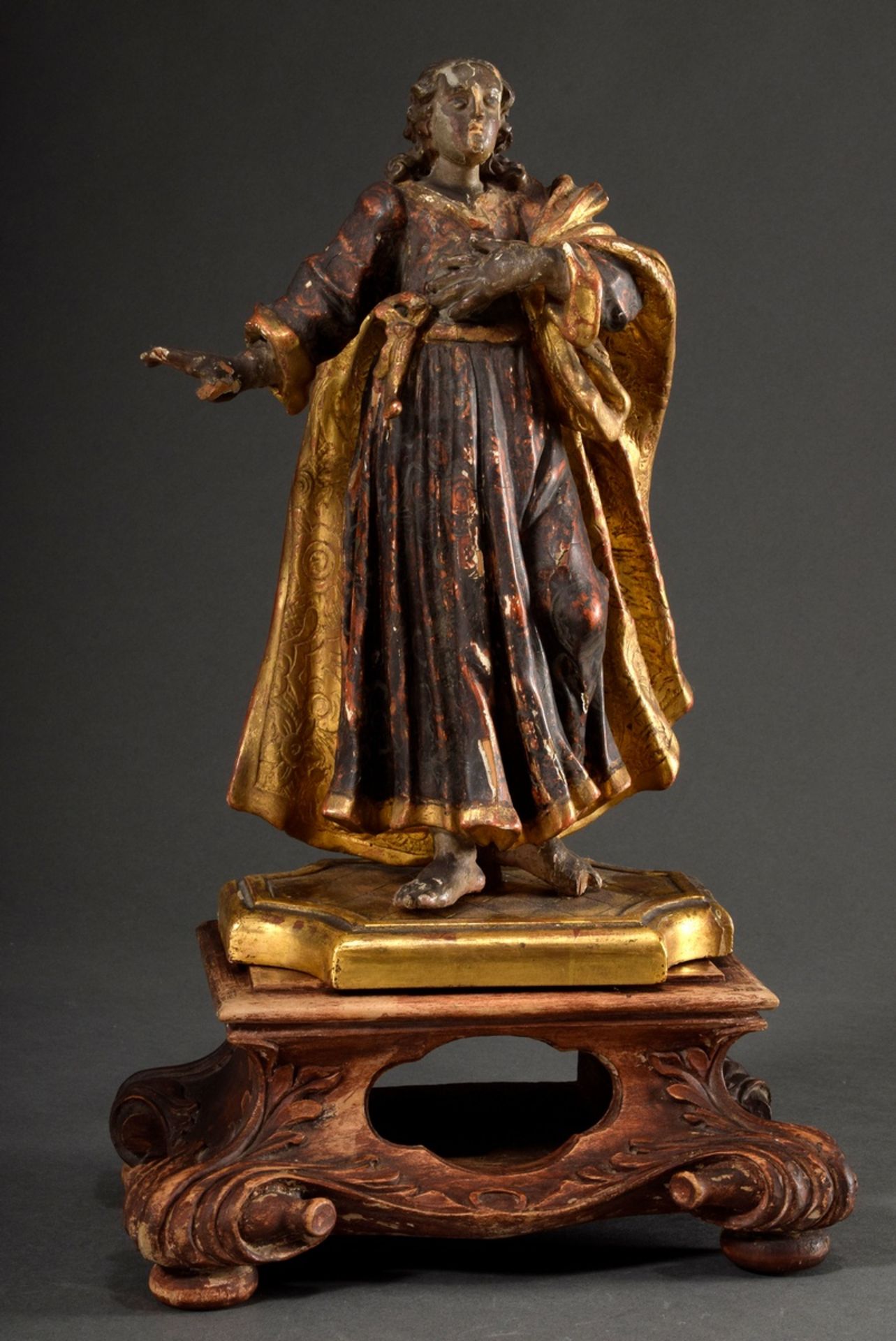 Sakralskulptur „Stehender Heiliger“, Holz geschnitzt mit Resten von farbiger Fassung (H. 32cm), Soc