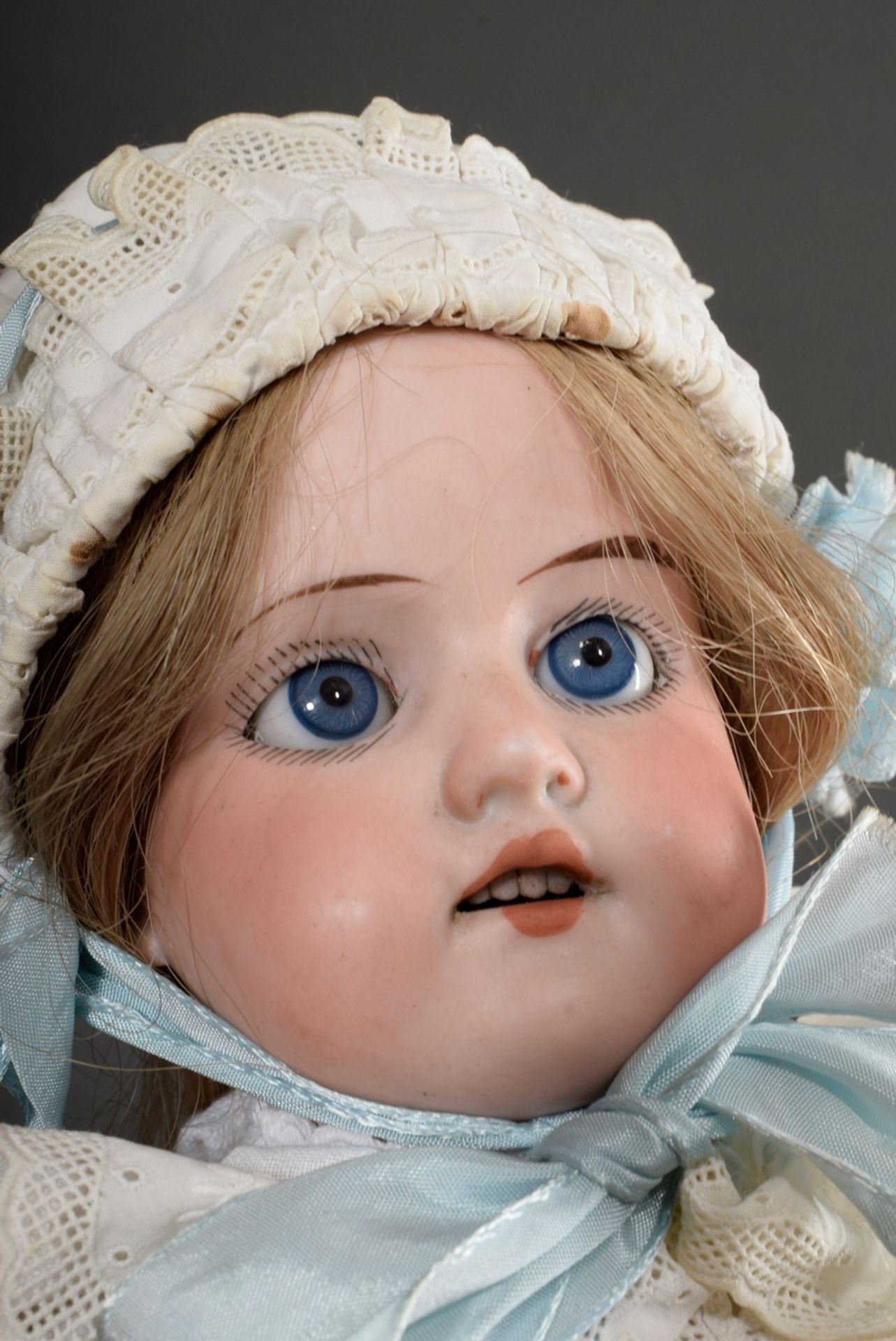 Small doll with porcelain chest head and bisque/leather body, blond real hair wig, blue glass eyes, - Image 4 of 8