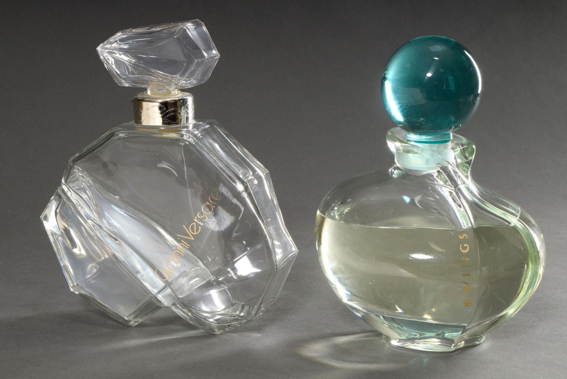 2 Modern perfume factices in oversize: Versace "Gianni Versace" (1981, h. 25cm) and Giorgio Beverly