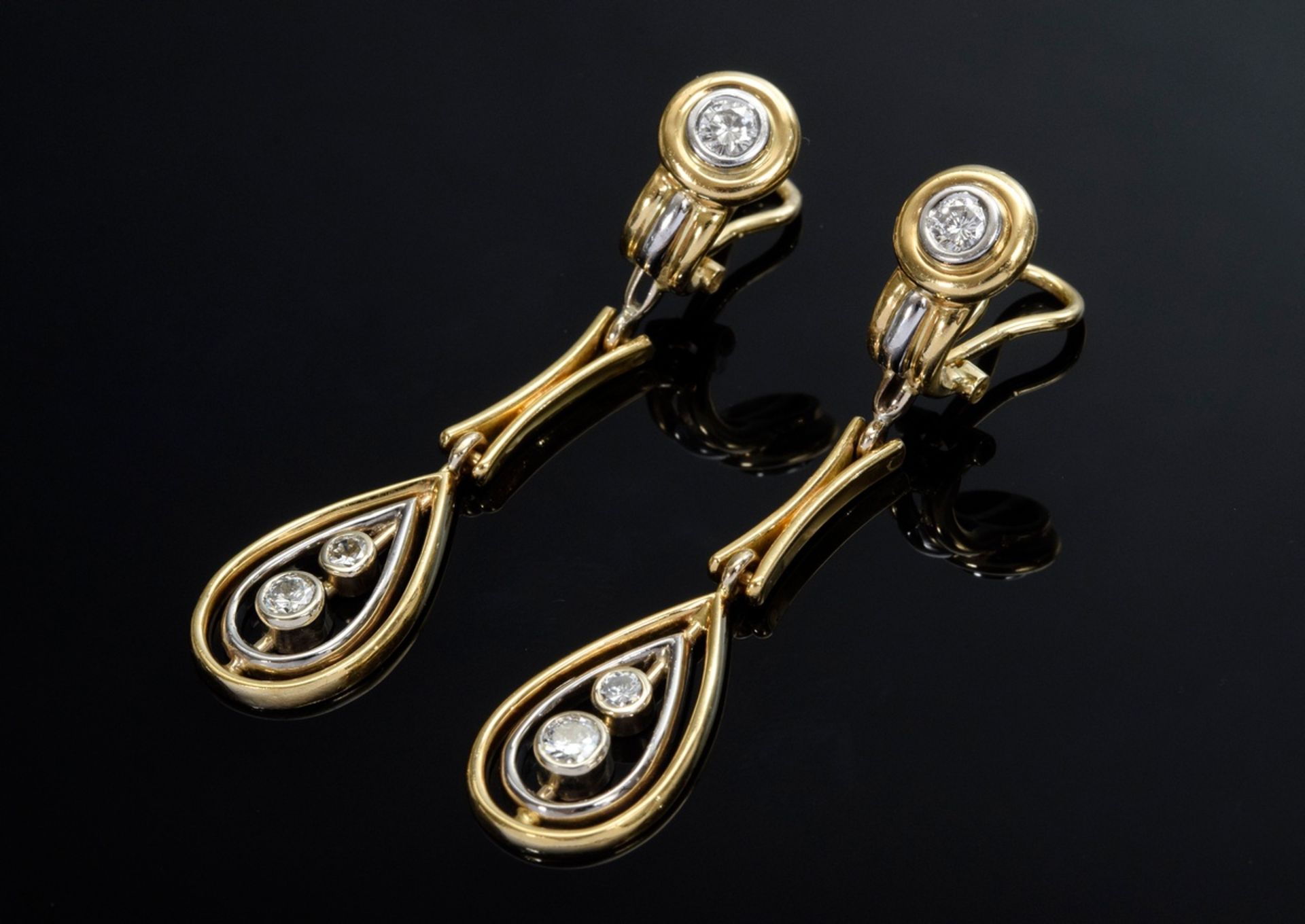 Pair of modern yellow and white gold 750 earrings with diamonds (together approx. 0.70ct/VSI/TCR-TC