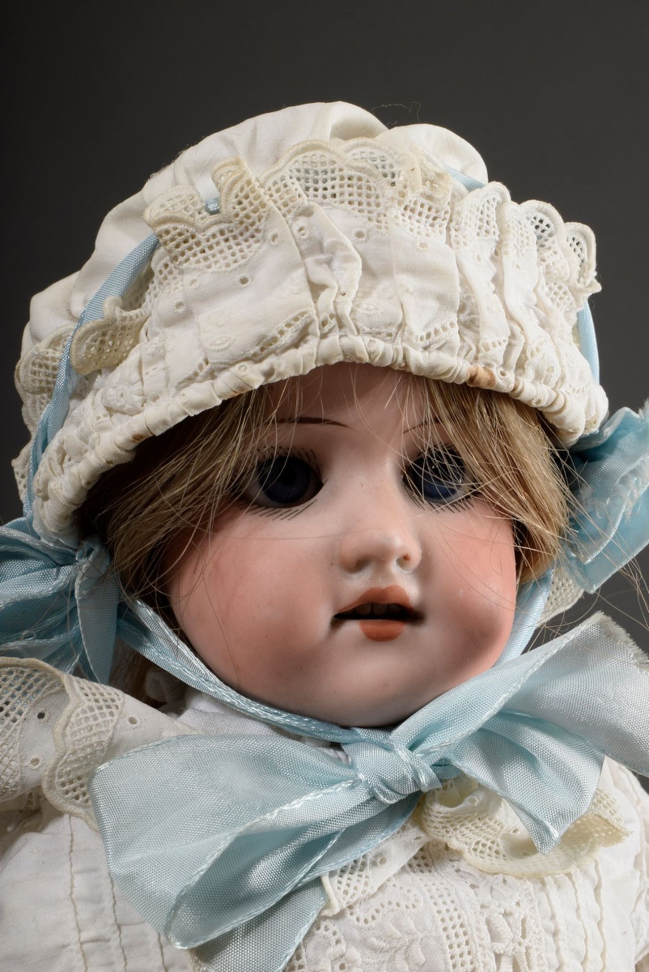 Small doll with porcelain chest head and bisque/leather body, blond real hair wig, blue glass eyes, - Image 2 of 8