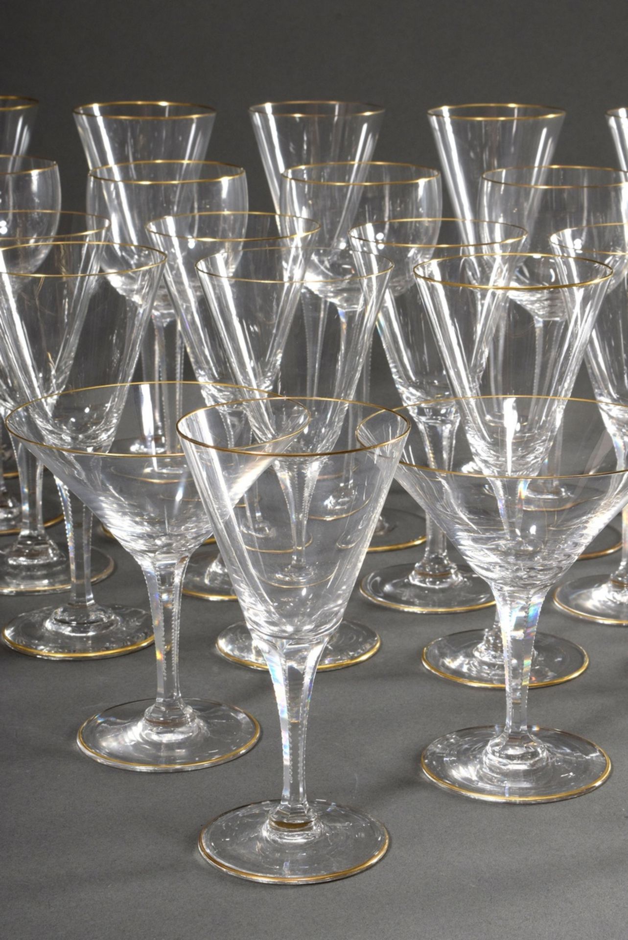 41 pieces drinking set with faceted stem, pointed goblet form, notched cut and delicate gold rim, c