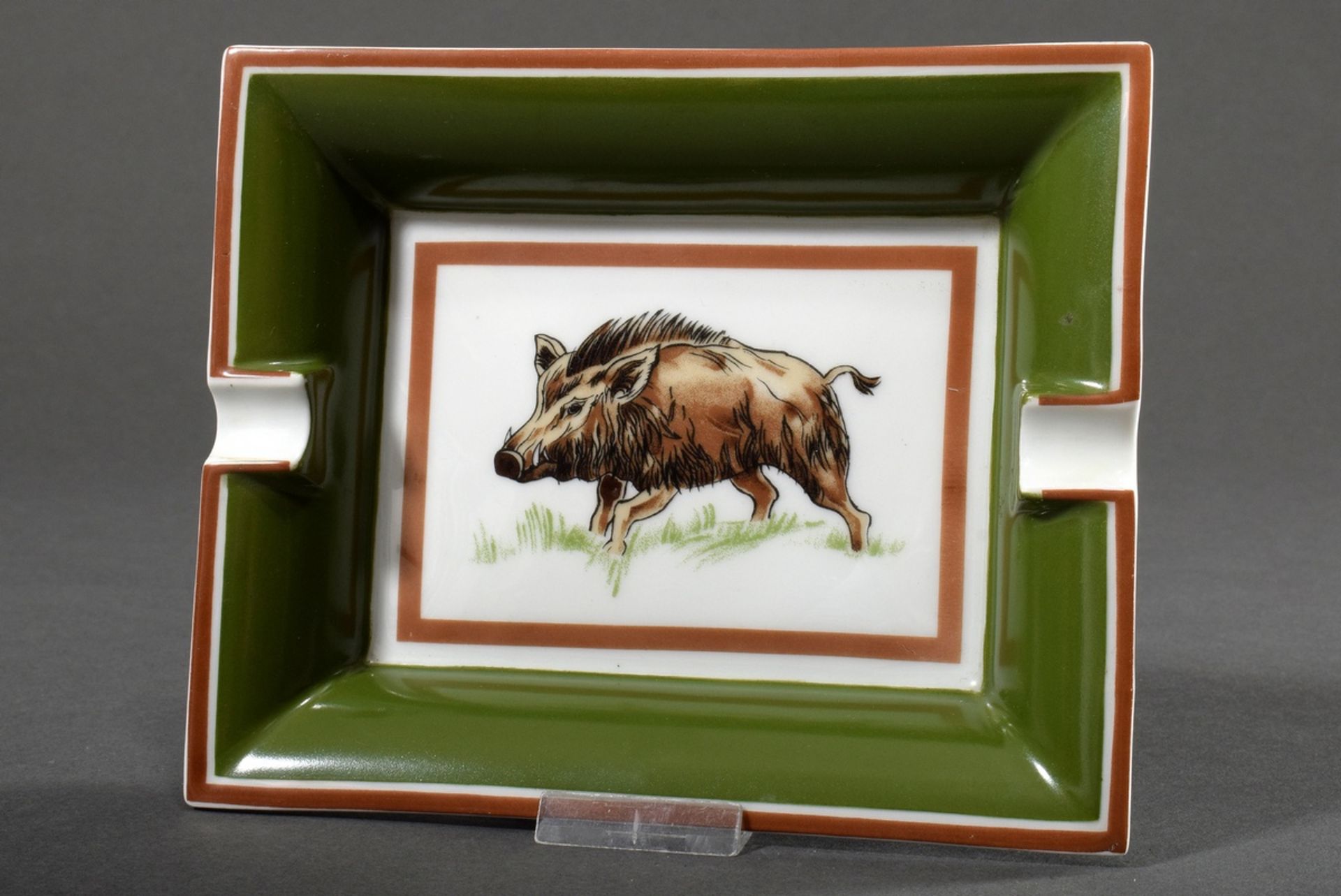 Hermès porcelain ashtray "Keiler", coloured print decoration in green/brown, 19x18cm, some rubbing