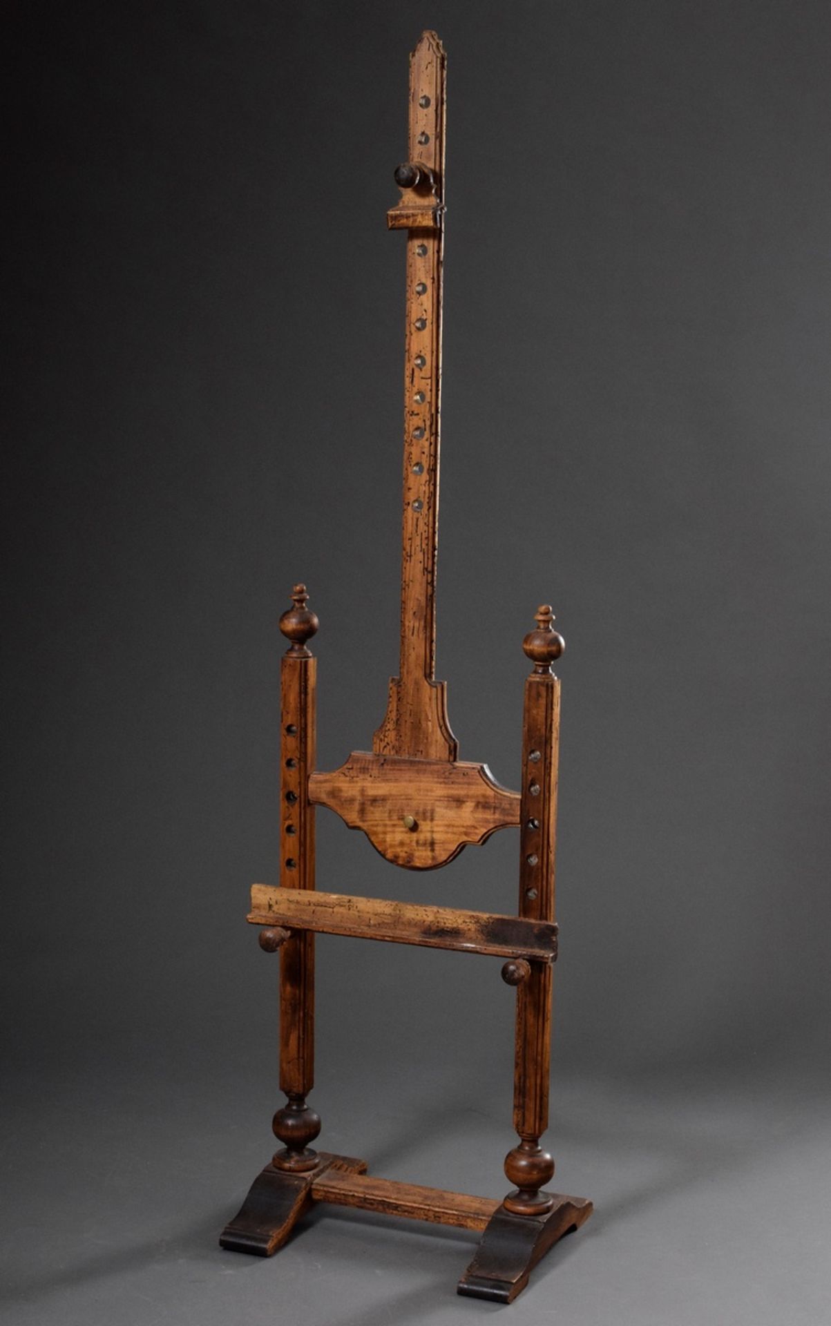 Rustic height-adjustable easel with turned balusters, softwood, 19th c., h. 180cm, old worm damage,