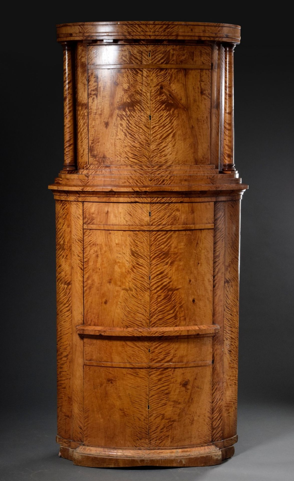 Imposing Empire corner writing cabinet with semi-circular front and lateral full columns in the top