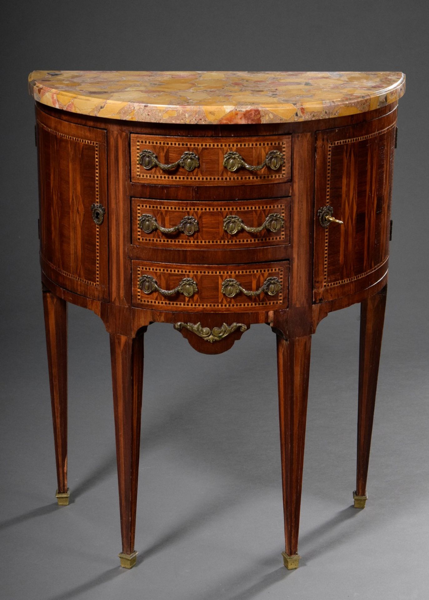 Dainty demi lune console chest with geometric marquetry and marble top in Louis XVI style, end of 1