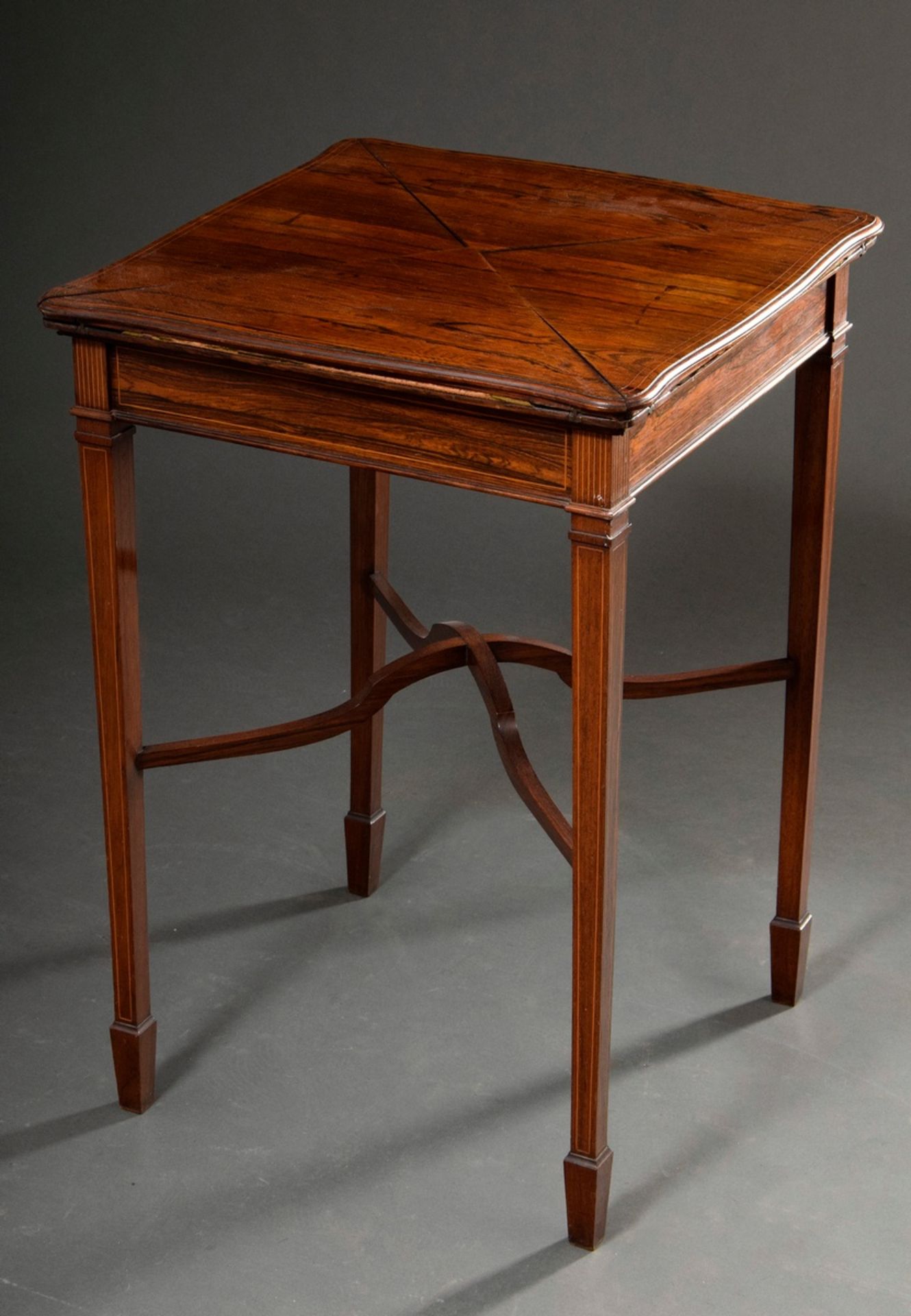 Victorian bridge table with four folding tops and felt cover, mahogany with fine ribbon inlays, Eng