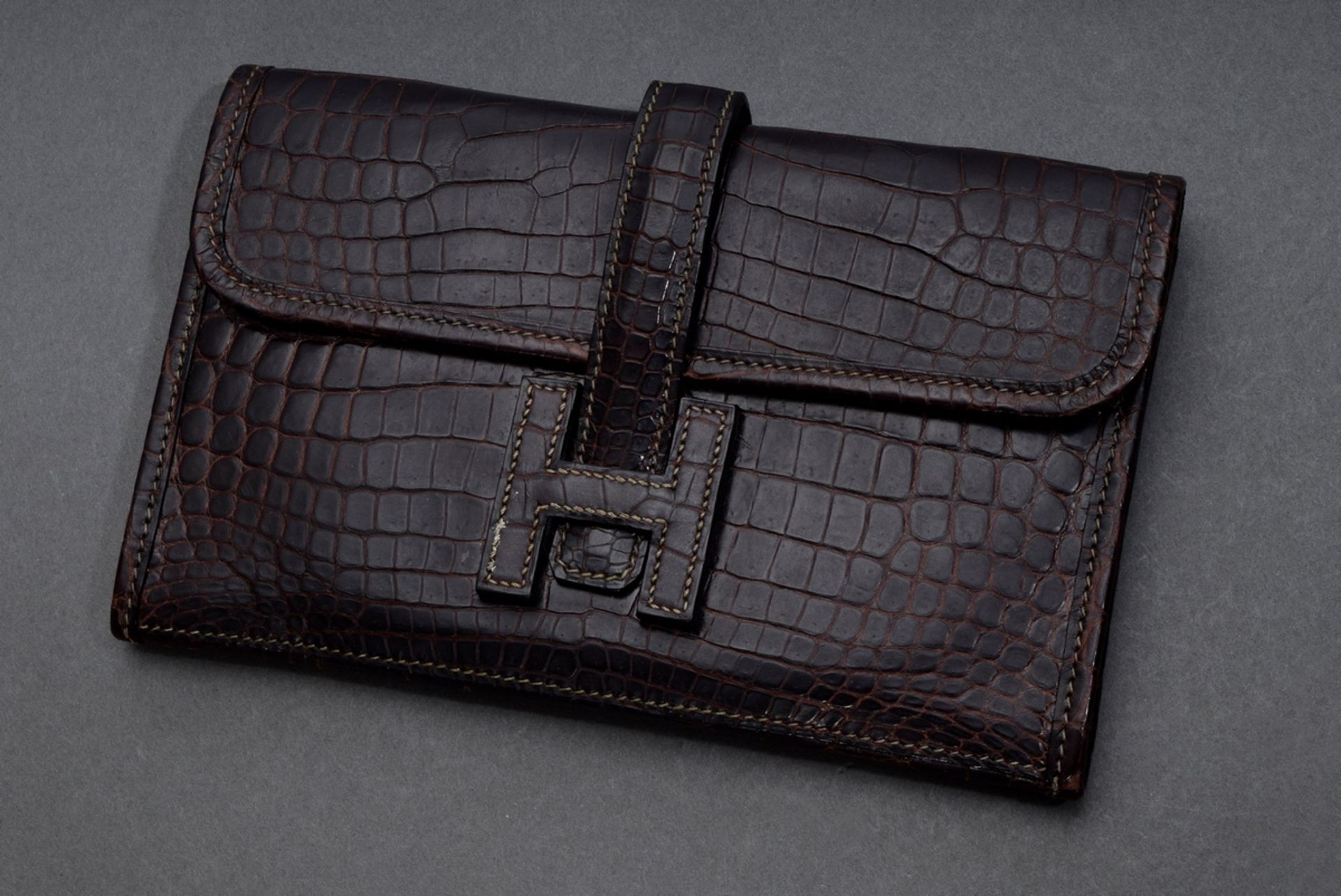 Brown Hermès croco "Jige Clutch" with clasp "H", inscribed: Hermès Paris Made in France", 12.5x19.5