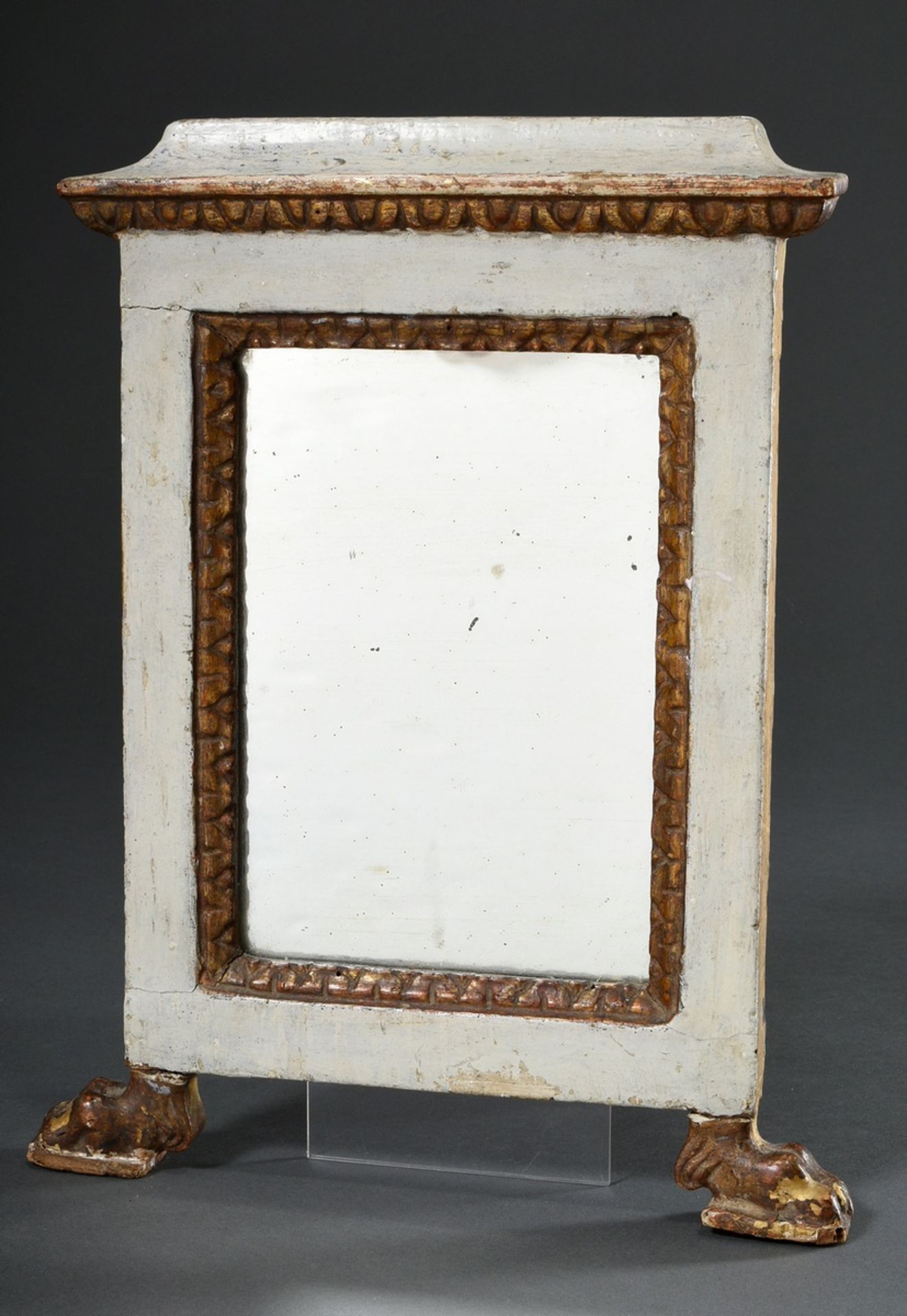 Small angular Empire mirror with gilded leaf frieze and paw feet, carved wood, white/gold painted, 