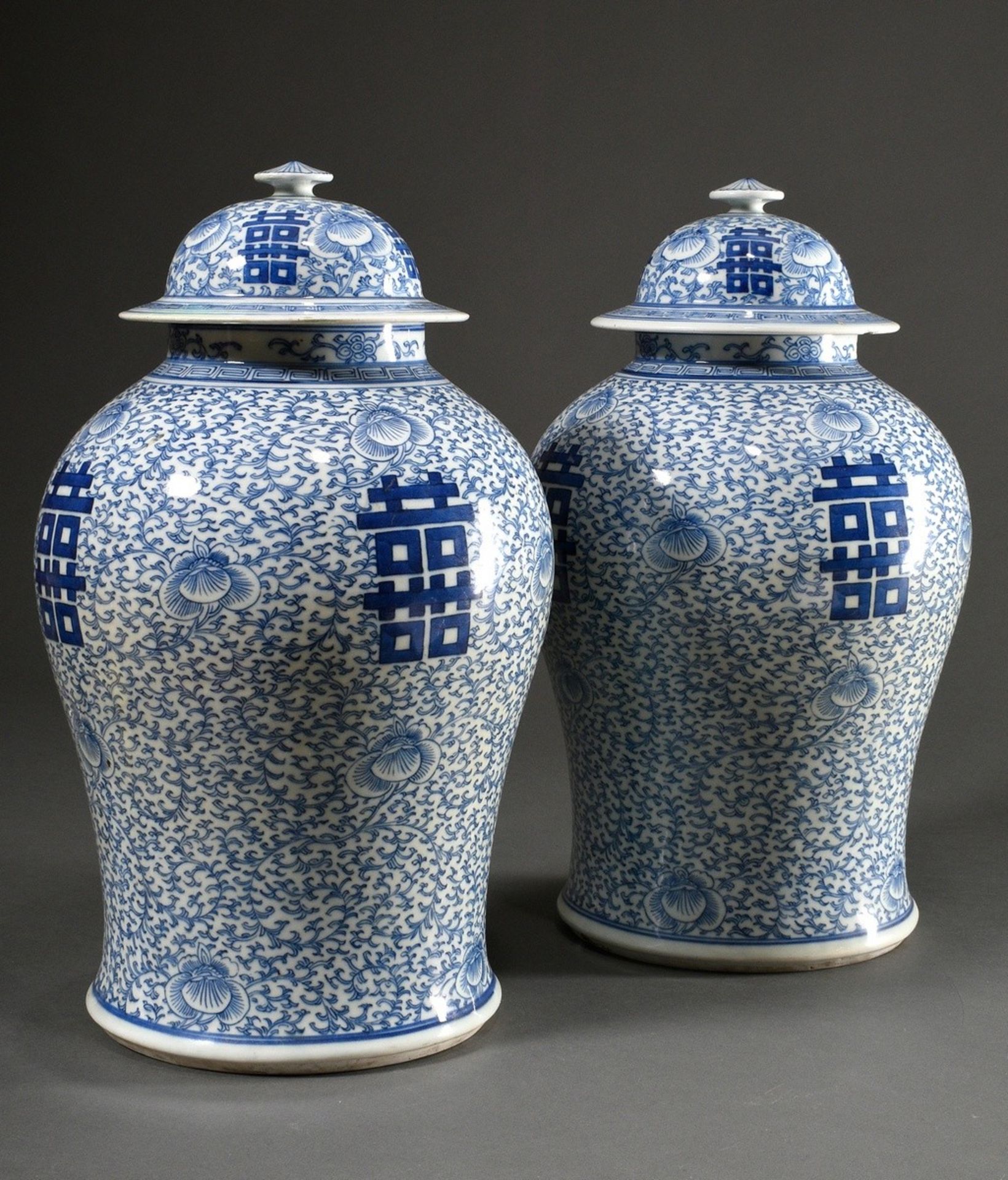 Pair of large Chinese porcelain lidded vases in baluster form with floral blue-and-white painting a - Image 2 of 14