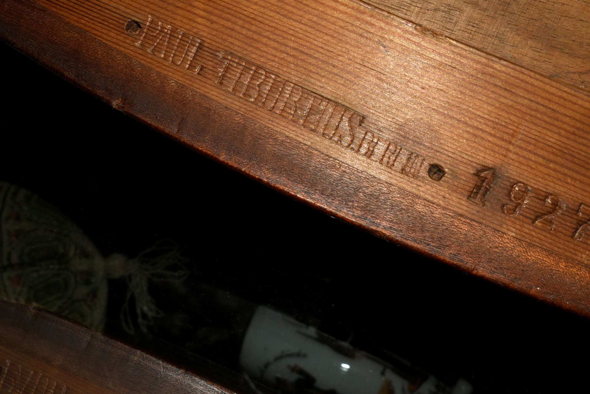 Low oval mahogany display table with glass top and side roll closure, underside signed. "Paul Tibur - Image 6 of 6