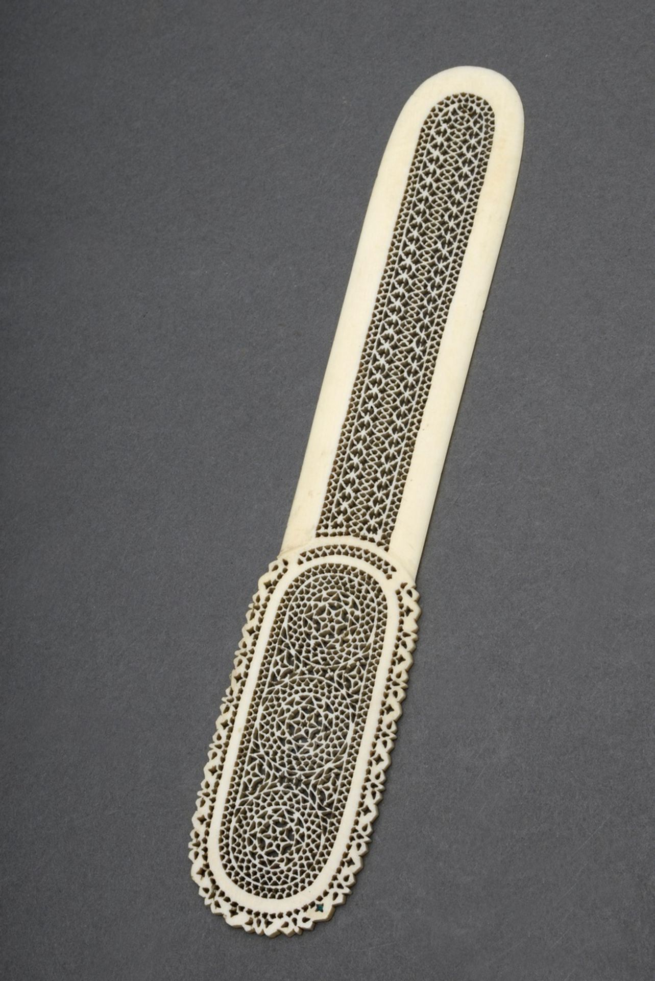Indian ivory letter opener in ornamentally sawn openwork, 19th century, l. 24cm, licence according