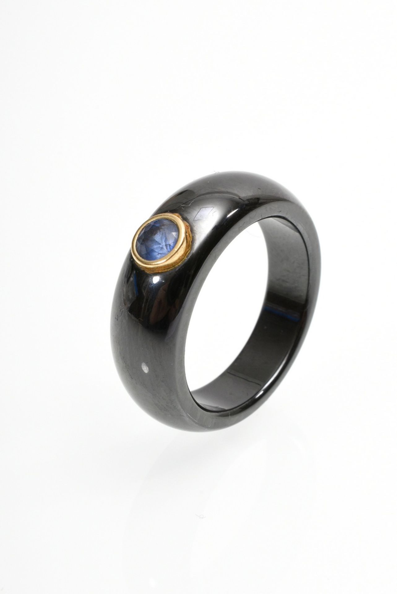 Carbon ring with polished surface and set sapphire in yellow gold 750 bezel setting, 6g, size 54