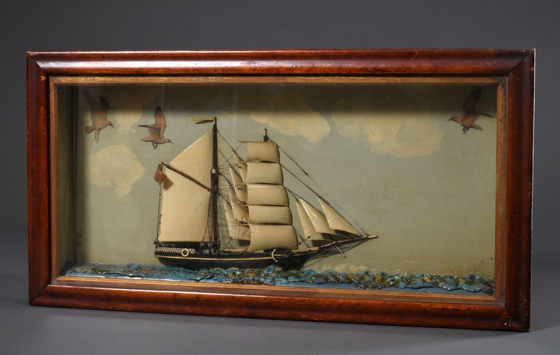 Diorama with ship half model "British two-master with seagulls", England early 20th c., with maple 