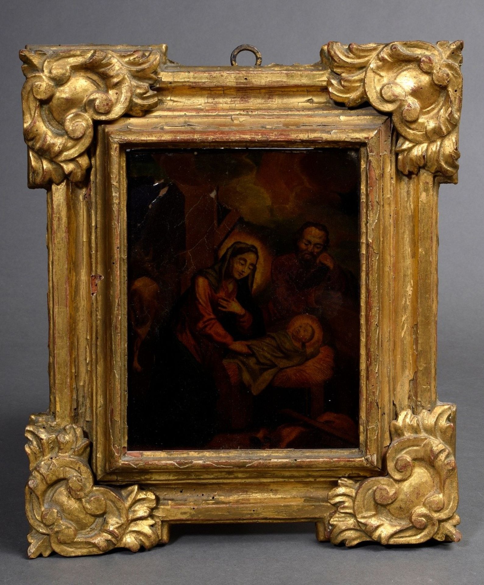 Sakrales Hinterglasbild "Heilige Familie" in opulentem goldstaffiertem Rahmen (kleine Defekte), col