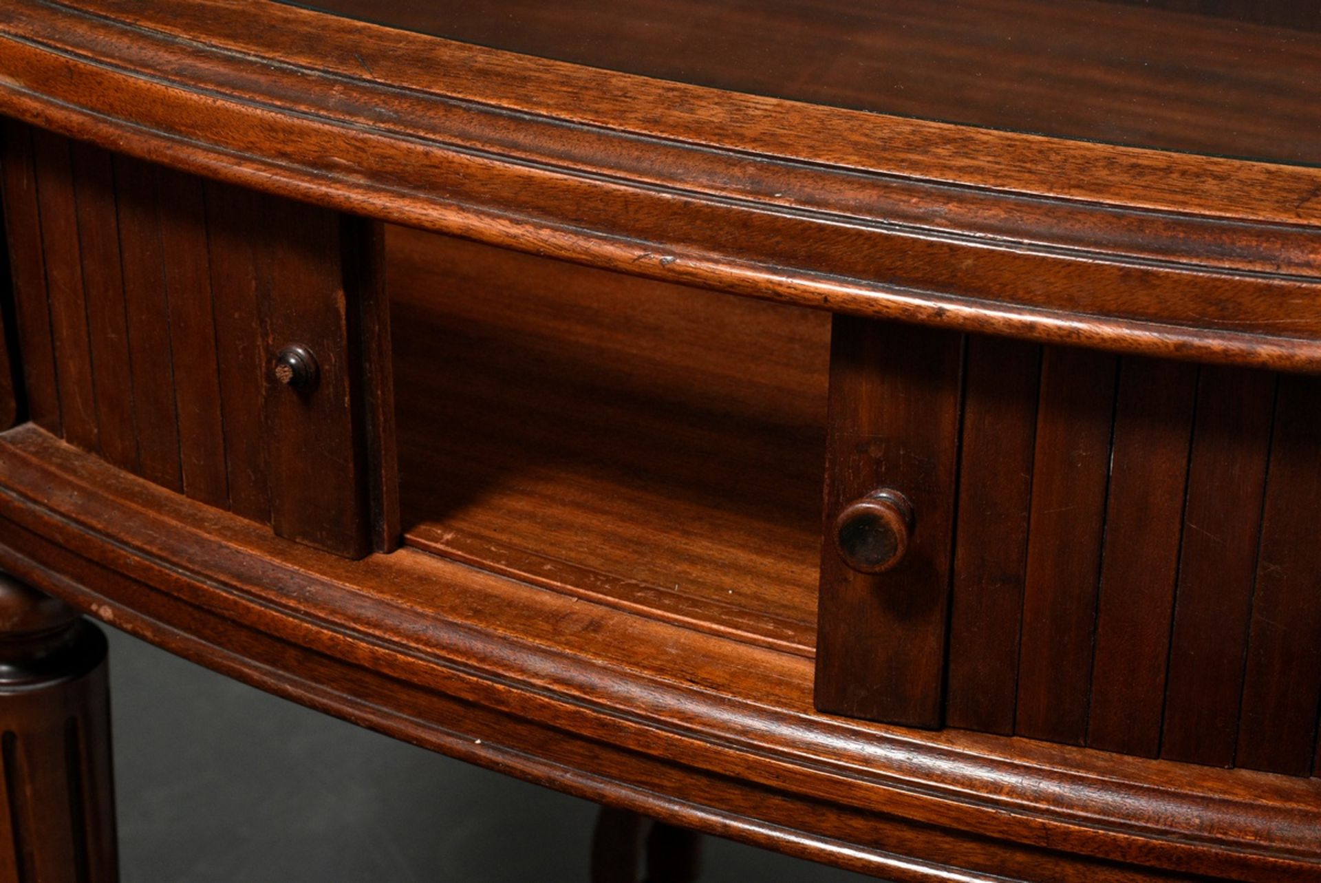 Low oval mahogany display table with glass top and side roll closure, underside signed. "Paul Tibur - Image 3 of 6