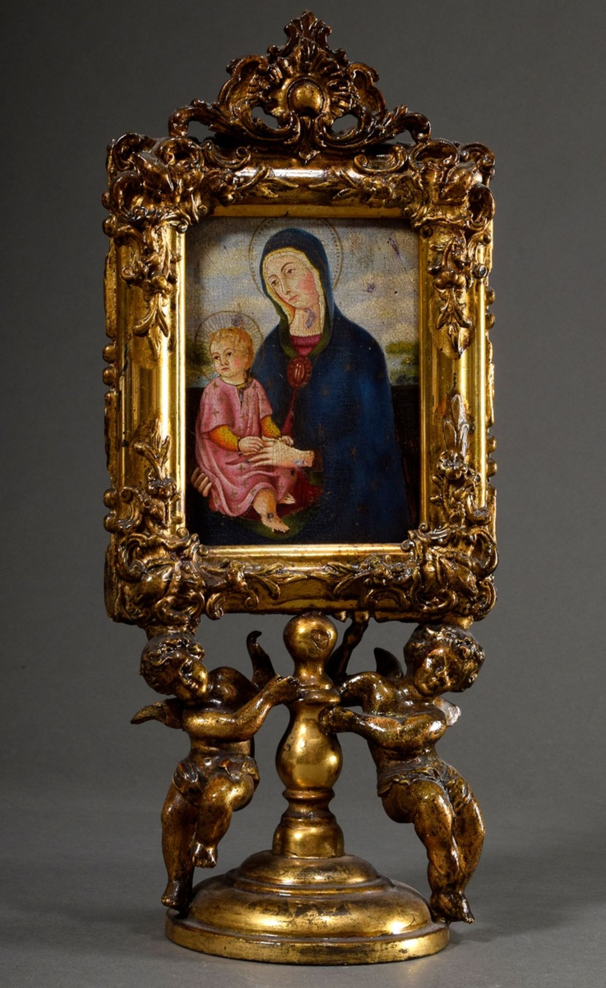 Sakrales Tafelbild "Muttergottes" in figürlichem Präsentoir mit zwei Engeln, Holz vergoldet, 18./19