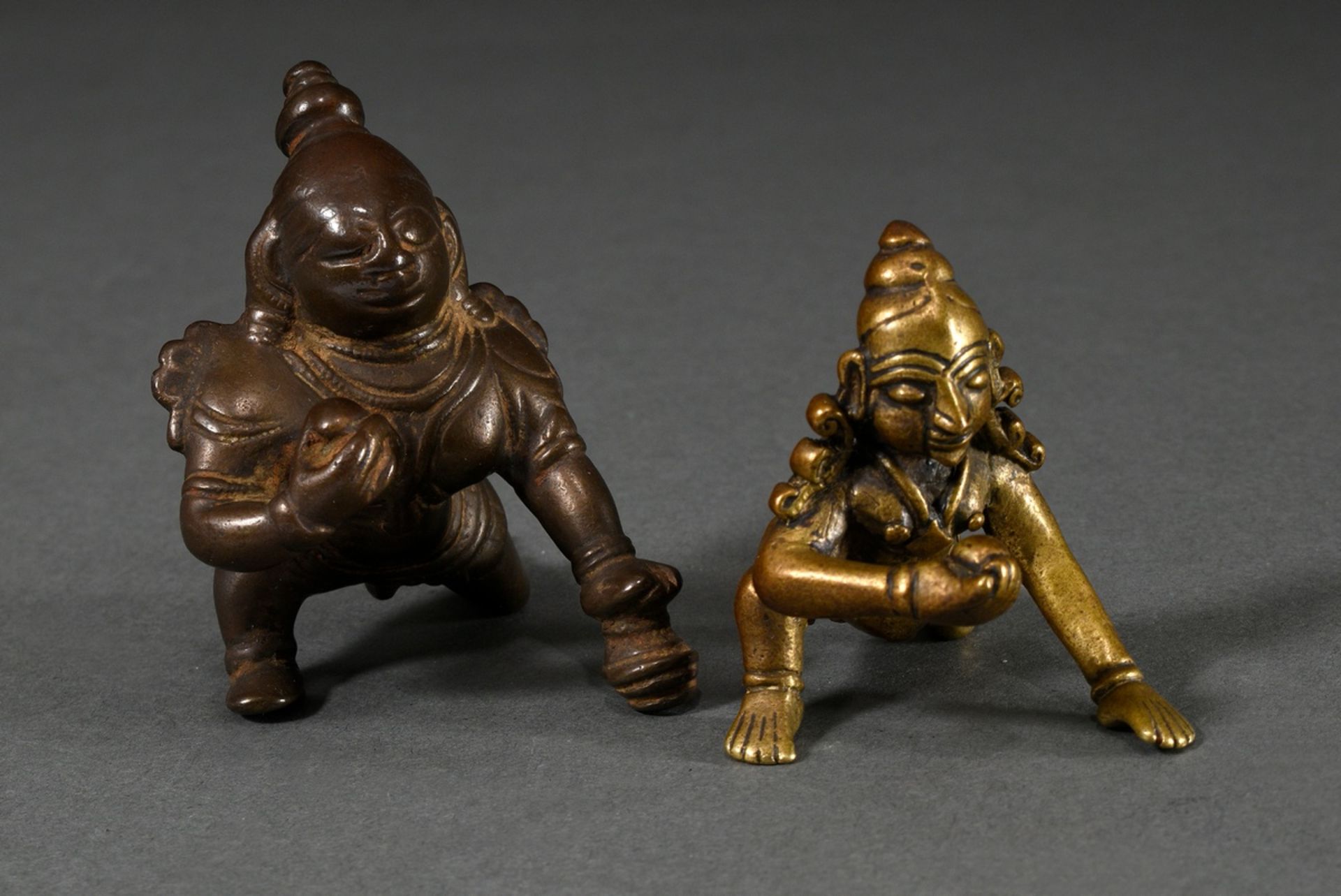 2 Various bronze and brass figures "Bala Krishna crawling with a butter ball in his right hand", In