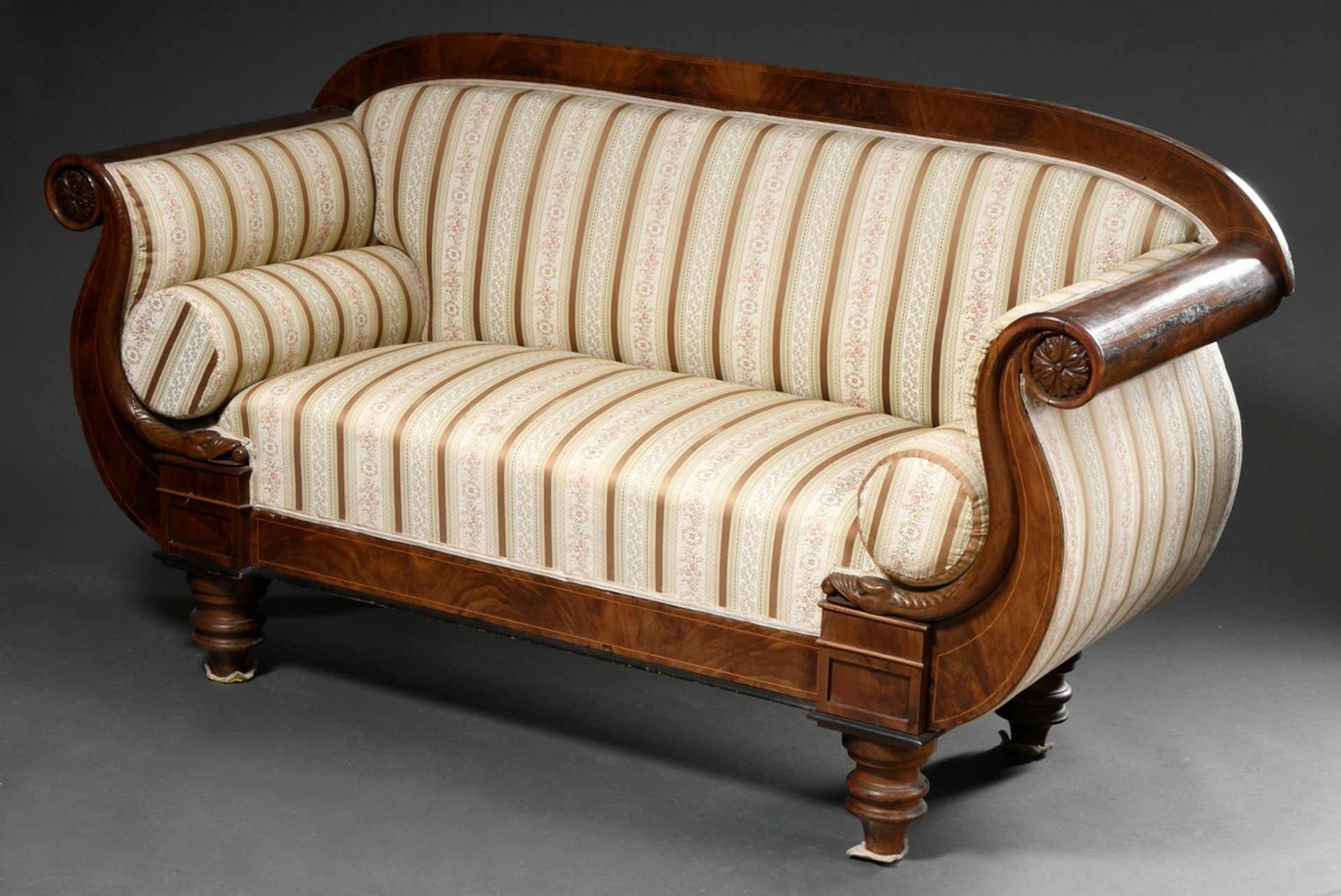 Small Biedermeier sofa with plastic snakes on the backrests, mahogany veneered on softwood with rib