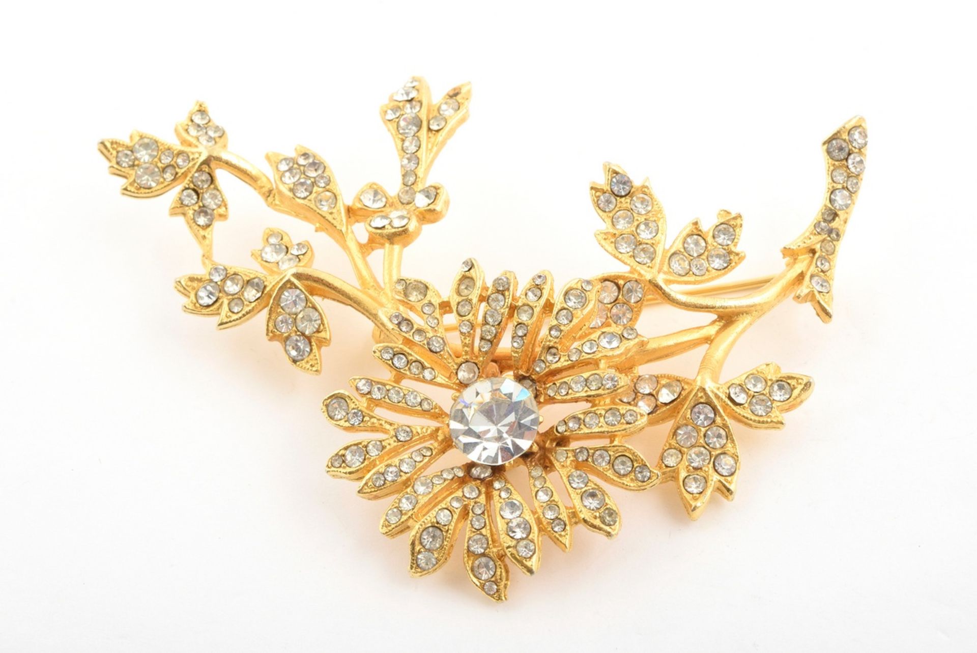 Gold-plated flower brooch with rhinestones made by "Kramer" for "DIOR", 8x6cm