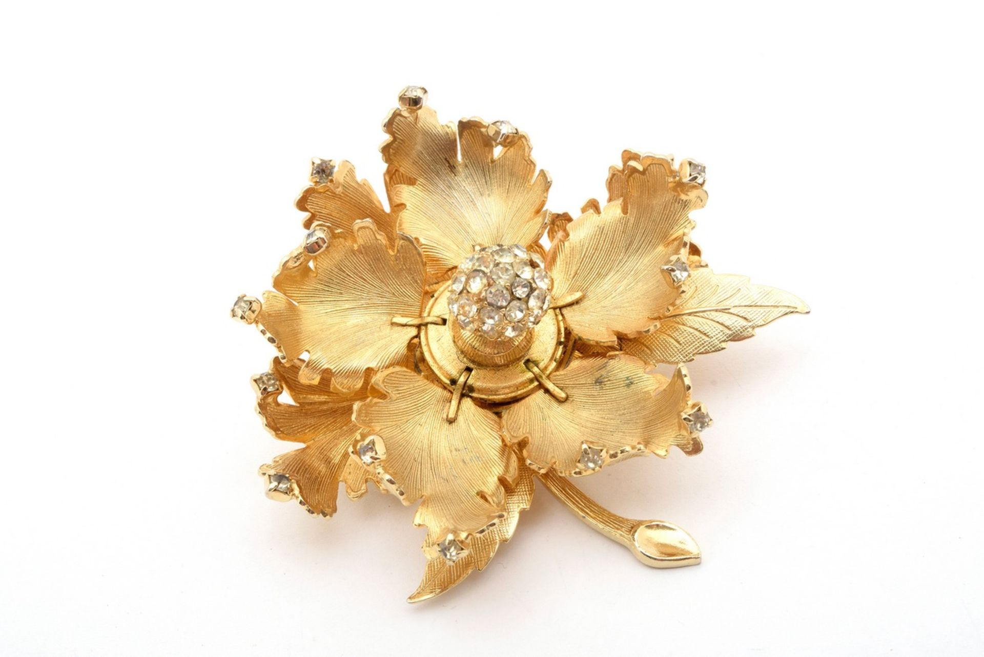 Large gilt flower pin with rhinestones, signed "Warner, New York", l. 6.5cm