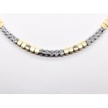 Collier mit 25 Brillanten, zus. ca. 0,75 ct, 90- er Jahre. 585/- Gelb- und Weißgold. Gesamtgewicht